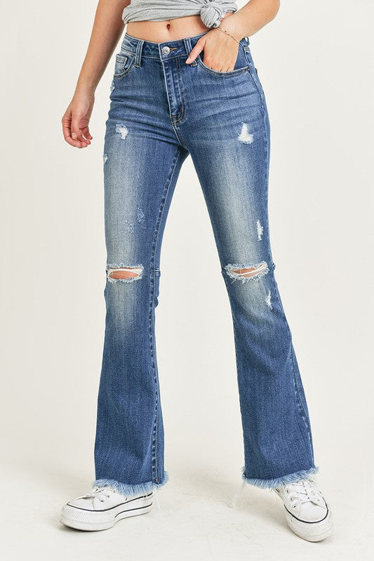 Risen High Rise Distressed Raw Hem Flare Jeans